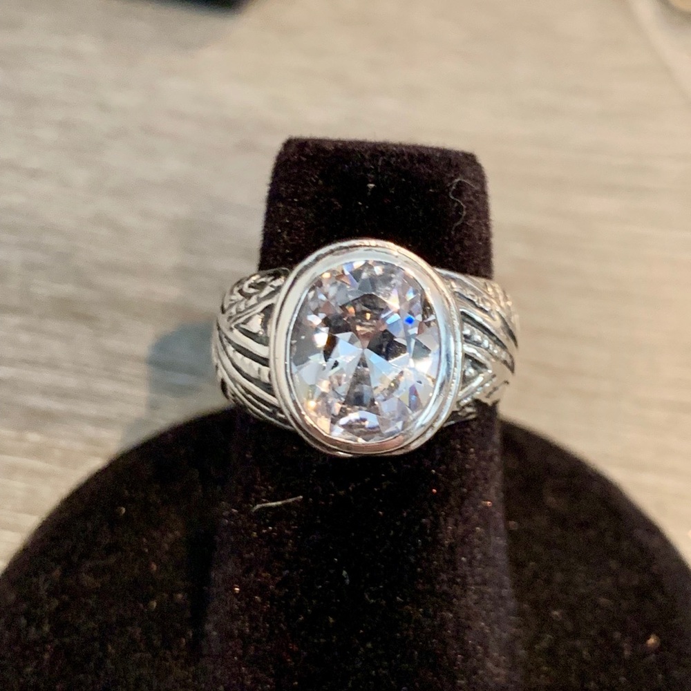 White Topaz / Sterling Silver Ring Size 5.